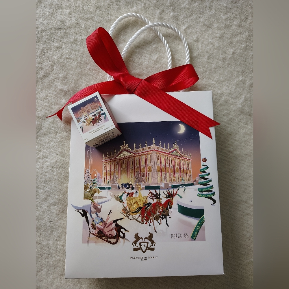Parfums de Marly Candle And Gift Bag with Red Ribbon.